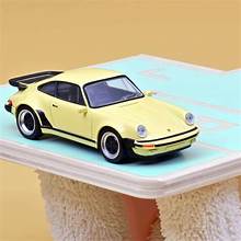 Load image into Gallery viewer, Norev 1/43 Palm Springs Gas Station w/ Yellow Porsche 911 Turbo G43000