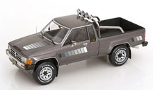 Load image into Gallery viewer, KK Scale 1/18 Toyota Truck Xtra Cab 4x4 (Hilux) 1985 Grey Met. KKDC181563