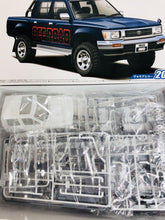 Load image into Gallery viewer, Aoshima 1/24 Toyota Hilux Double Cab 4WD 1994 Pickup Truck 06217